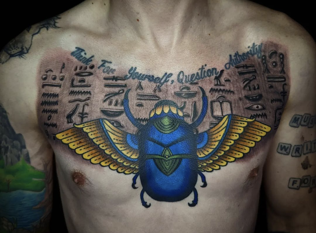 scarab beetle chest tattoo
